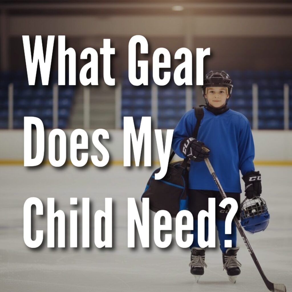 Youth hockey gear neatly arranged on a light background, including a helmet, gloves, skates, pads, and a stick.