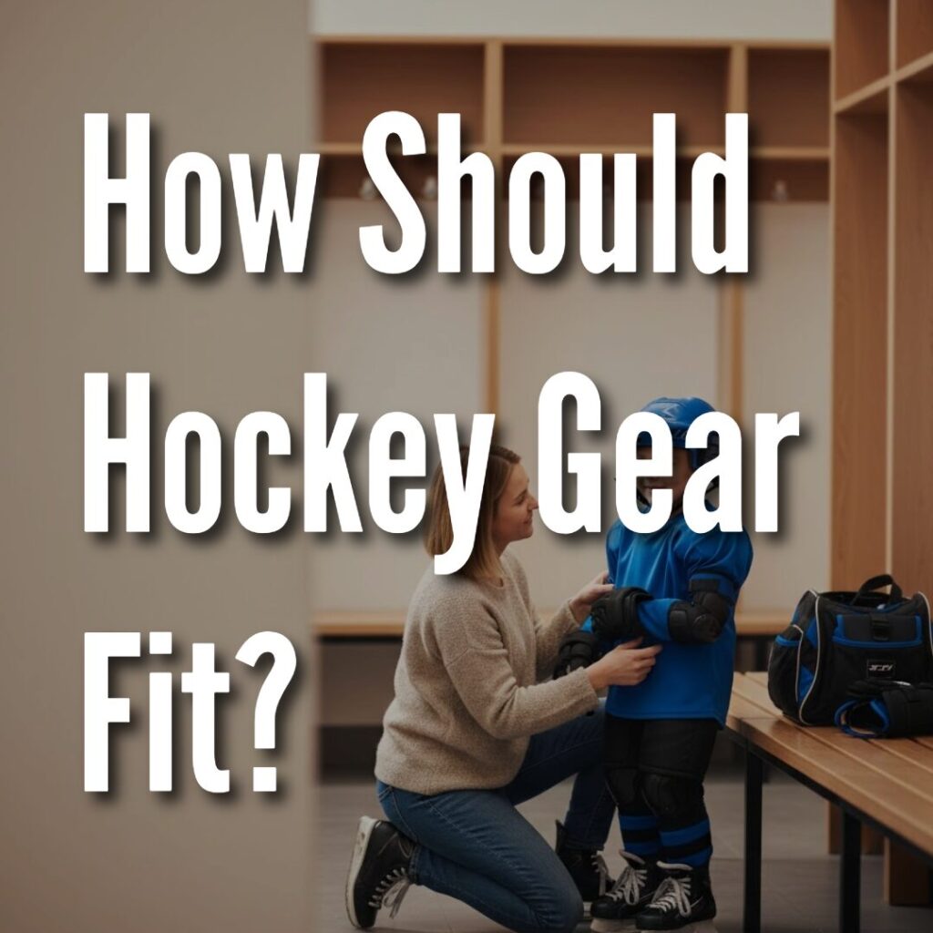 Youth hockey player in full gear standing on a light background, showing proper fit points.